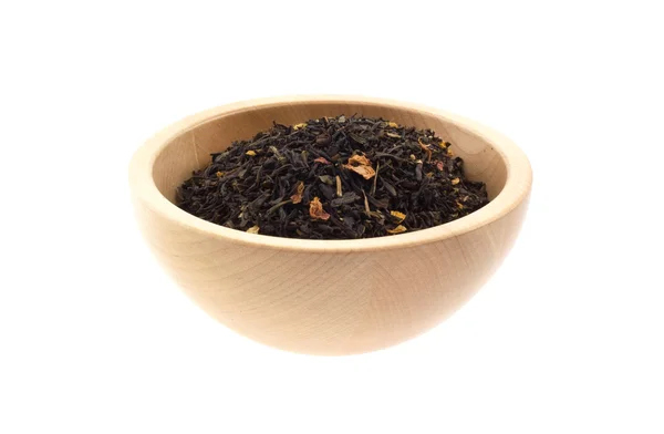 Chá preto em uma tigela de madeira — Fotografia de Stock