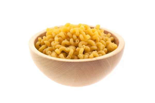 Spiral pasta in a wood bowl — Stock Photo, Image