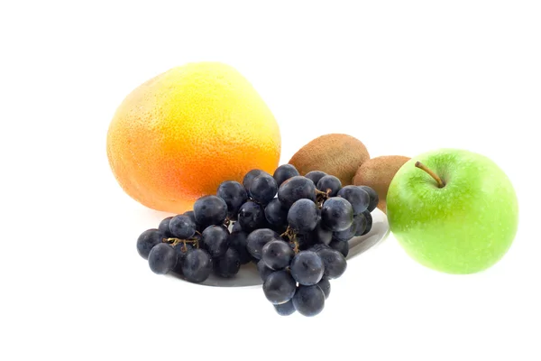 Frutas diferentes sobre un fondo blanco — Foto de Stock