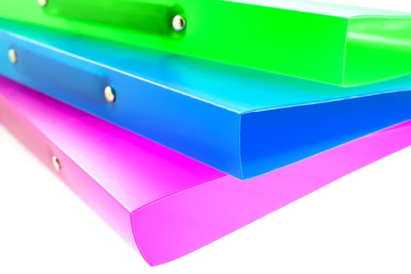 Три разноцветные папки — стоковое фото