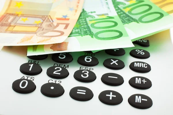 Notas de euro com calculadora — Fotografia de Stock
