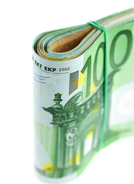 Rolado com notas de borracha euro — Fotografia de Stock