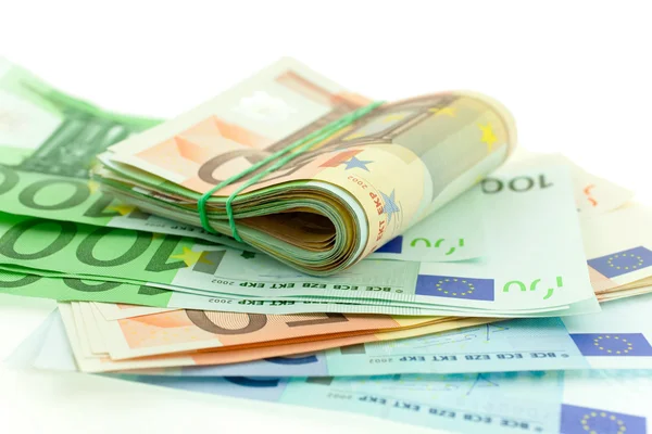 Rolado com notas de borracha euro — Fotografia de Stock