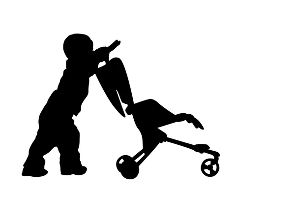 Силуэт ребенка с коляской — стоковое фото