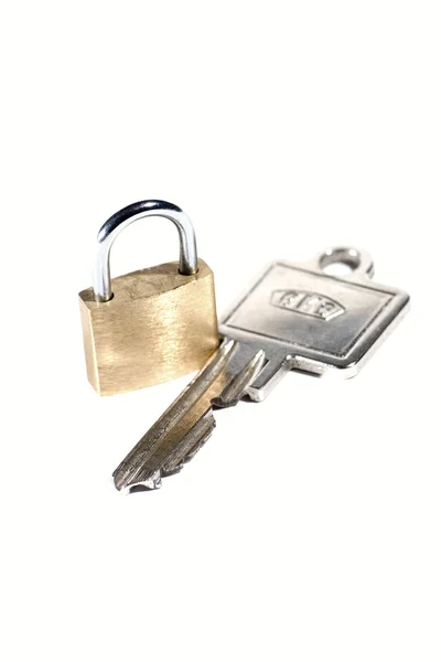Piccola serratura e grande chiave — Foto Stock