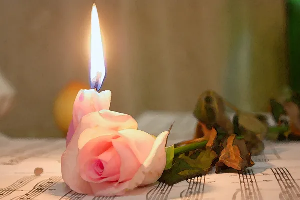 Kerze und Rose auf dem Notenblatt liegend — Stockfoto