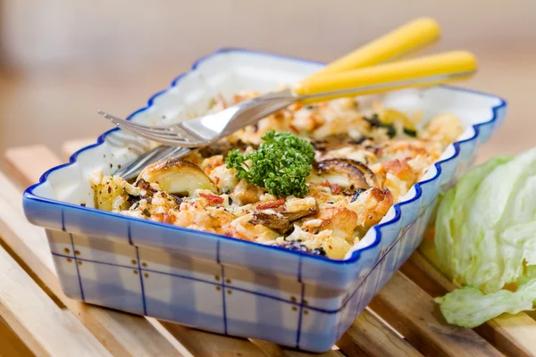 Roast gnocchi with spinach — Stok fotoğraf