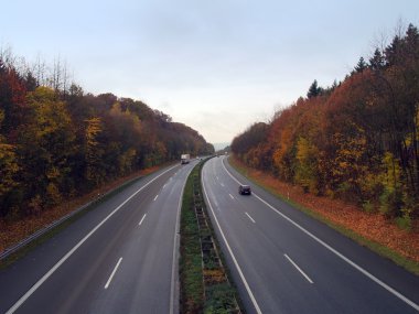 German autobahn in the autumn clipart