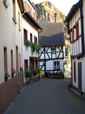 Narrow ancient street in small town Alte clipart