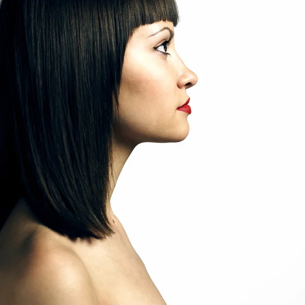 Profil för kvinna med strikta frisyr — Stockfoto