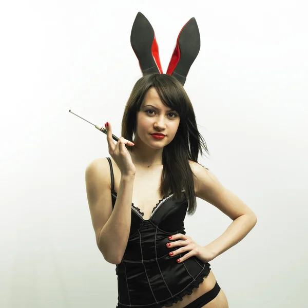 Mujer seductora con orejas de conejo — Foto de Stock