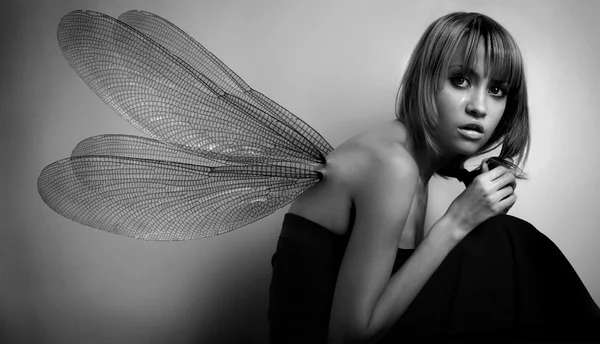Portret van meisje met vleugels — Stockfoto