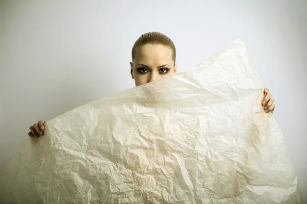 Elegante girl with sheet of paper — Stock Photo, Image