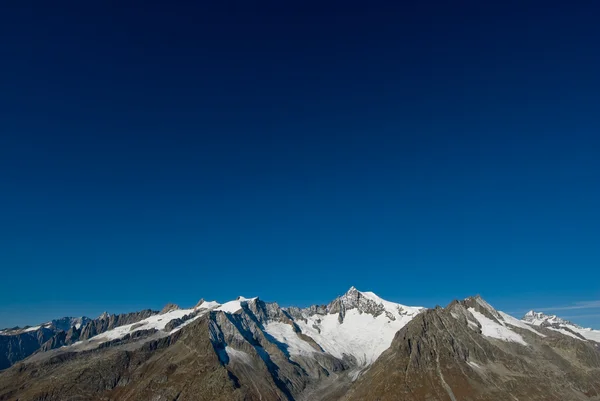 Syk ovan aletschhorn — Stockfoto