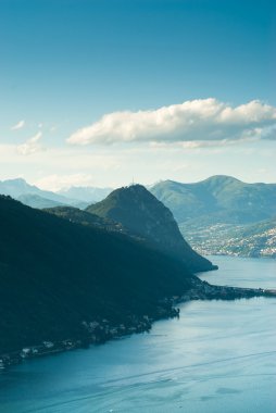 Monte San Salvatore and lake of Lugan clipart