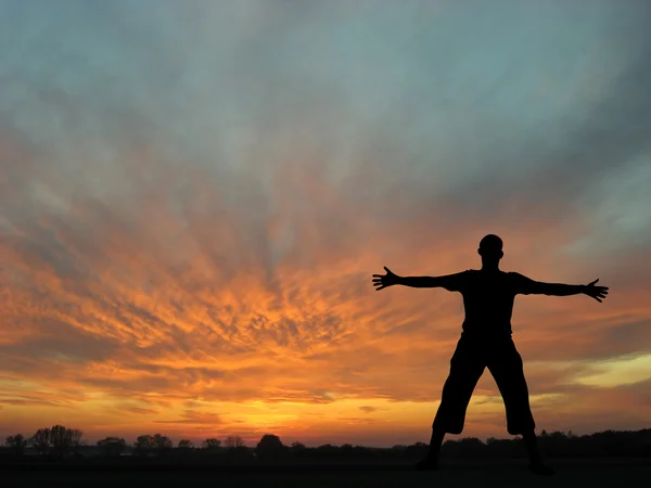 Man in sunset — Stock Photo, Image