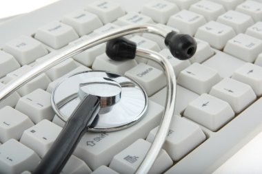 Keyboard with stethoscope clipart