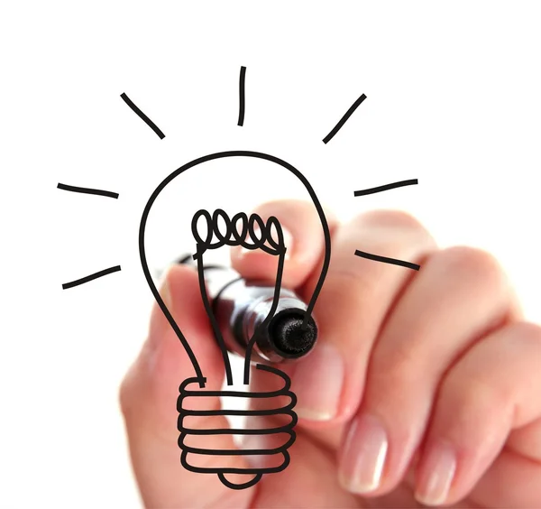 Hand drawing a light bulb — Stock Photo, Image