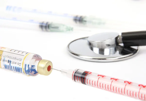 stock image Syringe and medicine with stethoscope