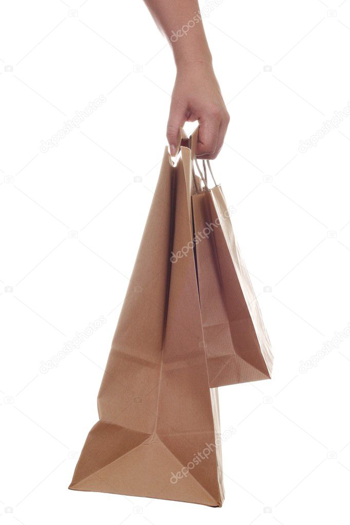 Woman hand carrying shopping recycling b