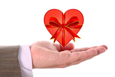 Red heart on male hand clipart