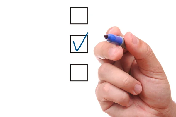 List of checkboxes and hand with pen — Stock Photo, Image