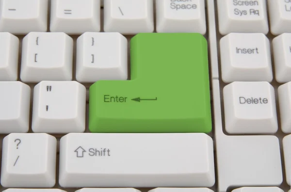 Klawiatura komputerowa z zielony klawisz — Zdjęcie stockowe