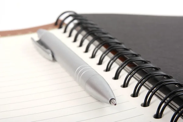 Business spiral organizer and pen — Stock Photo, Image