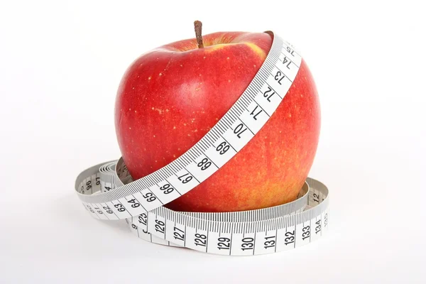 Apple et un ruban à mesurer — Photo