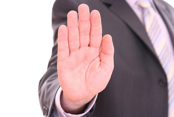 Men's hand signaling stop