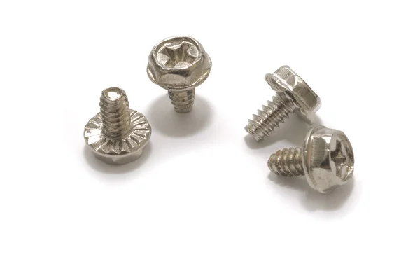 Four screw on white — Stock Photo, Image