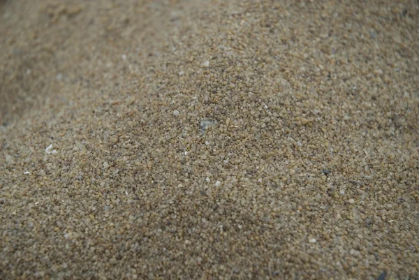 Strand zand omhoog sluiten — Stockfoto