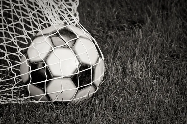 Soccer Ball in the Net - B & W — стоковое фото