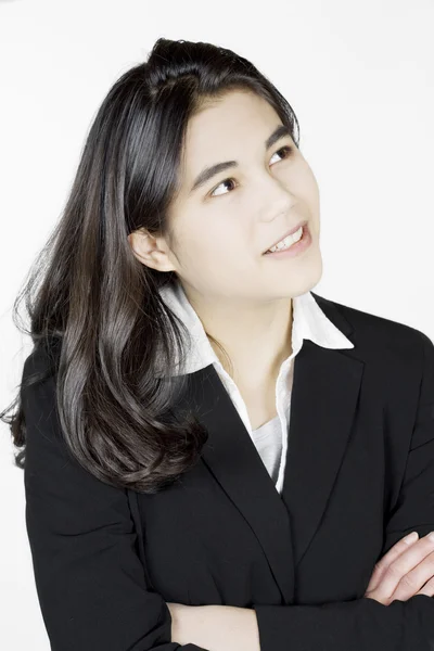Young woman in business suit thinking — Stock Photo, Image