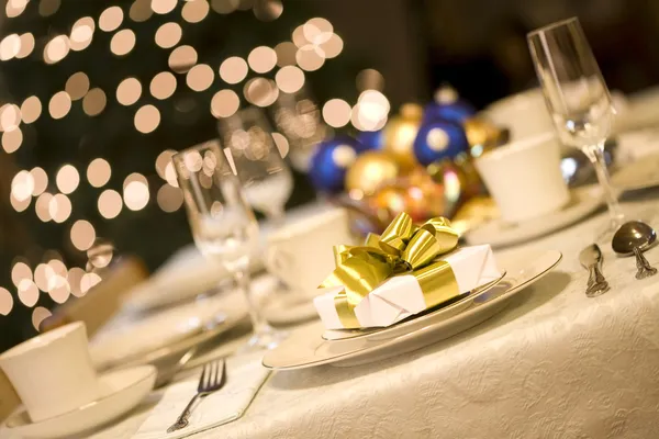 Gold present on dining table — Stock Photo, Image