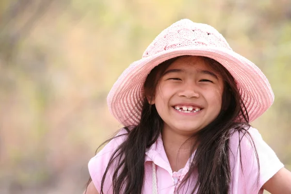 Adorable girl in pink outdoors — Stock Photo, Image