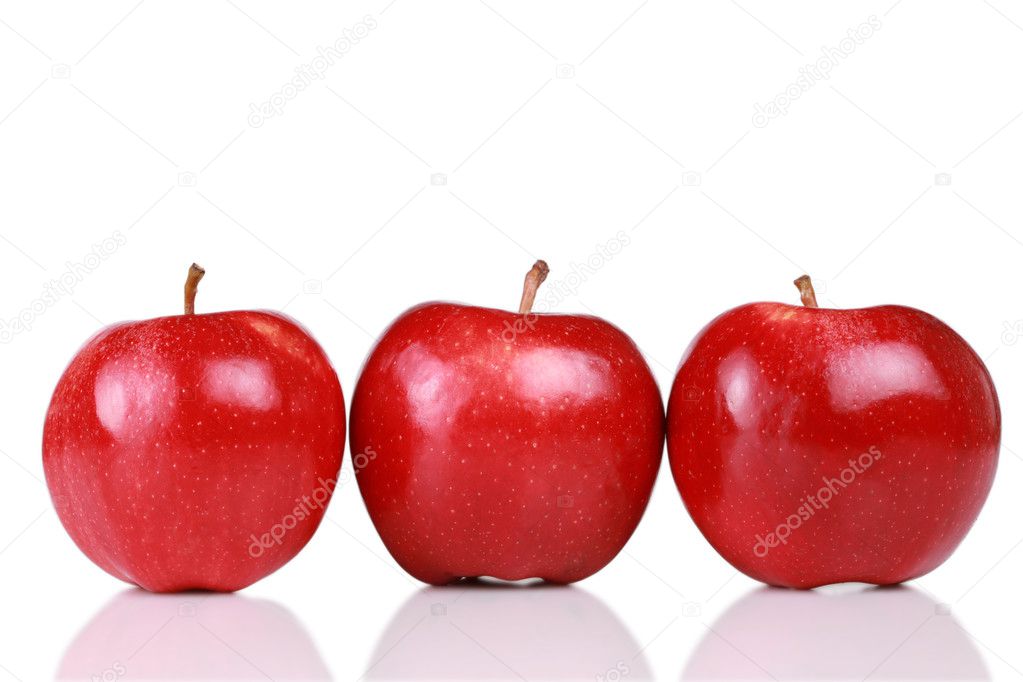 Three shiny red apples