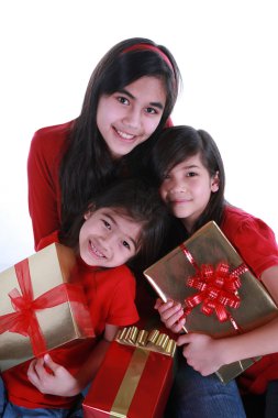 Three sisters holding presents clipart