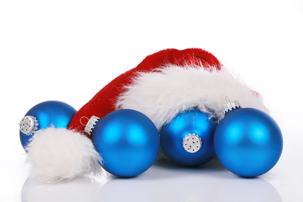 Röd santa hatt med blå ornament — Stockfoto