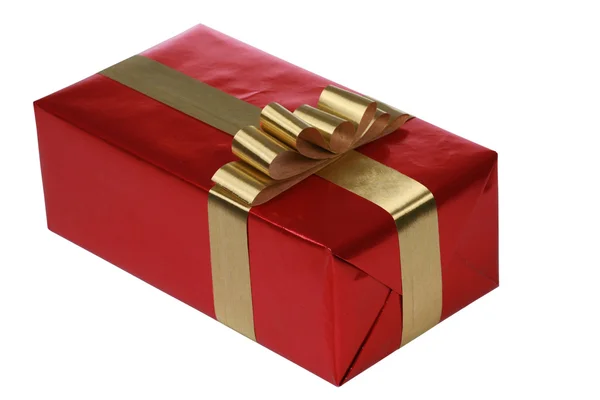 Rotes Geschenk mit goldenen Bändern — Stockfoto