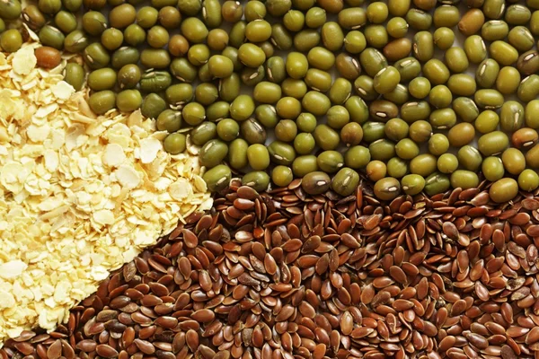 stock image Mung beans, flax seeds and soya flakes