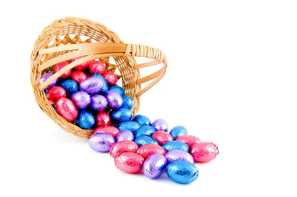 Woven basket with easter eggs — Stock Photo, Image
