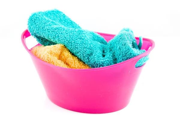 Vasca da bagno rosa con lavanderia Foto Stock Royalty Free
