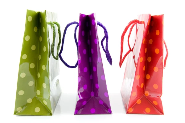 Три барвисті сумки для покупок Стокова Картинка