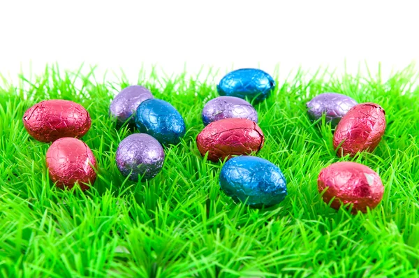 Uova di Pasqua su erba verde Fotografia Stock