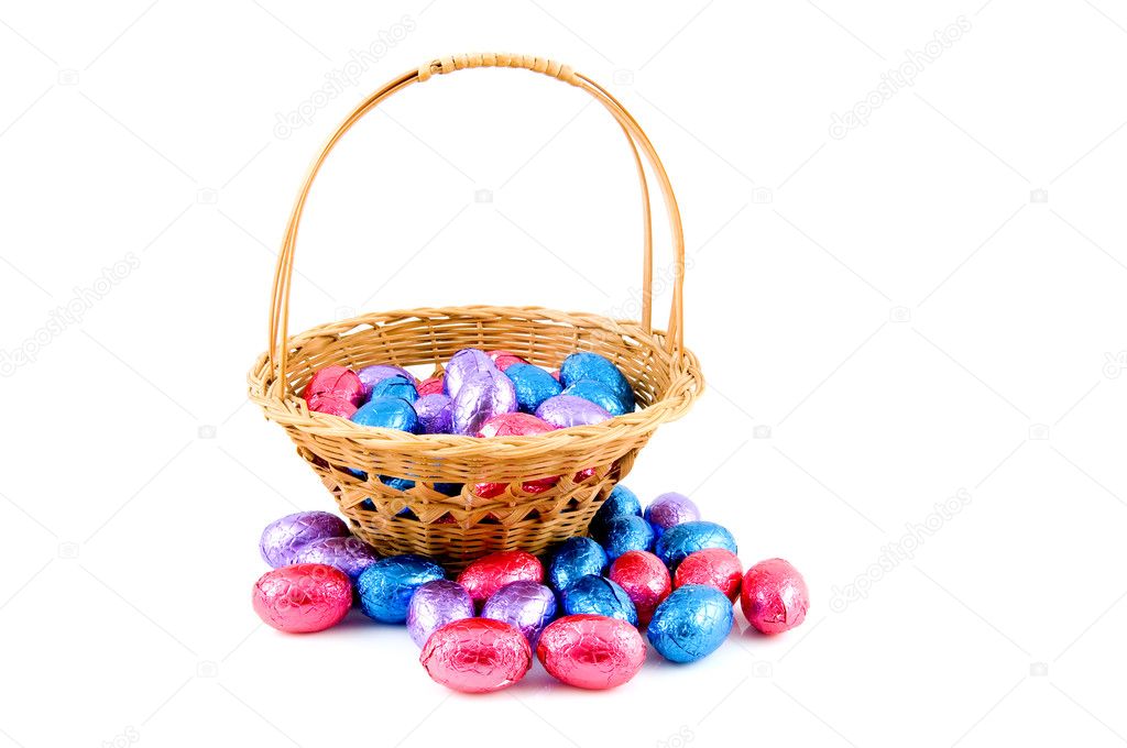 Woven basket with easter eggs — Stock Photo © Pholien #2419030