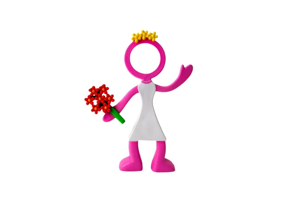 Figura divertida de juguete de una novia con flores — Foto de Stock