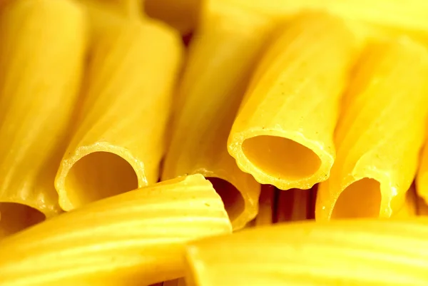 Handful of macaroni close up — Stock Photo, Image