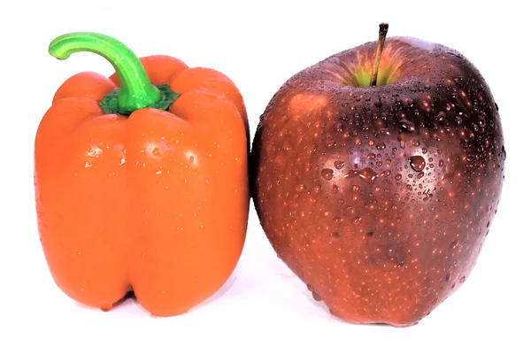 Red apple and red pepper — Stock Photo, Image