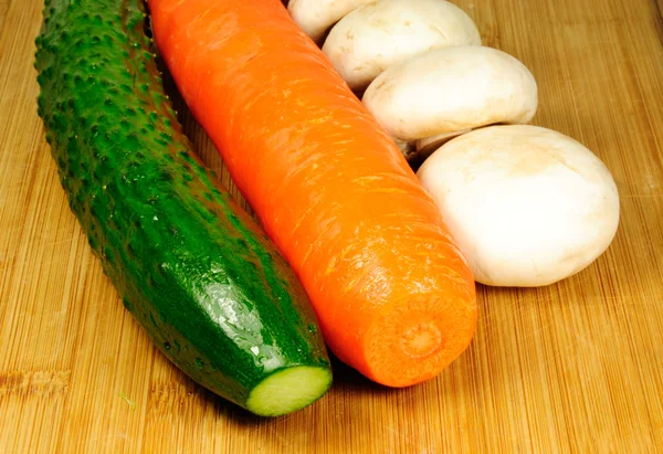 Cucumber carrot and mushroom — Stock Photo, Image